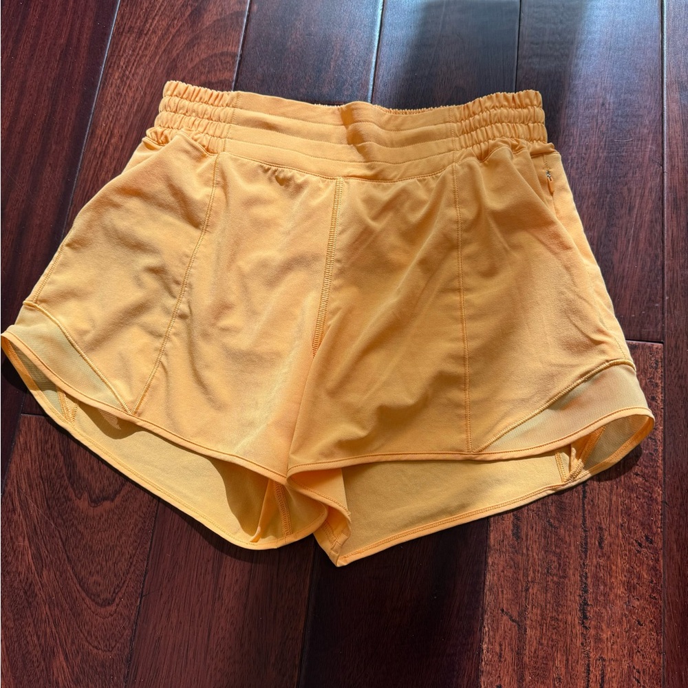Selling Lululemon shorts size 6 in orange color